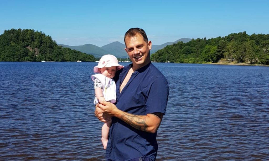 Richard and Millie in the water at Loch Lomond Waterftont