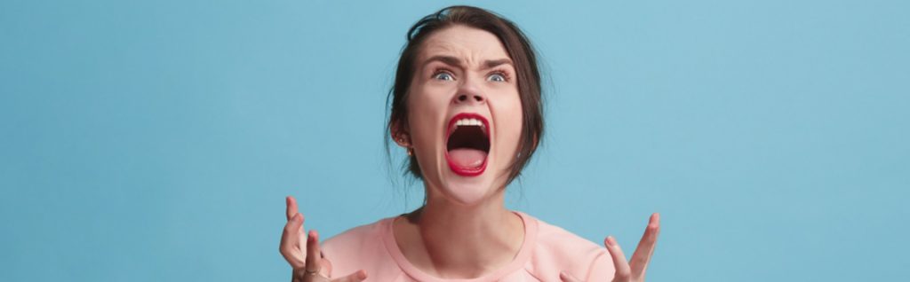 A girl screaming in anger