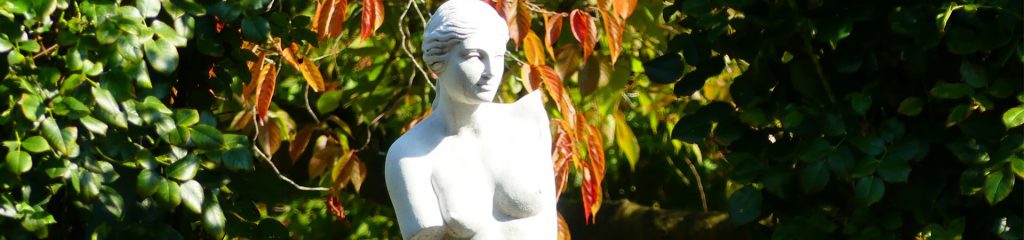a statue in a garden