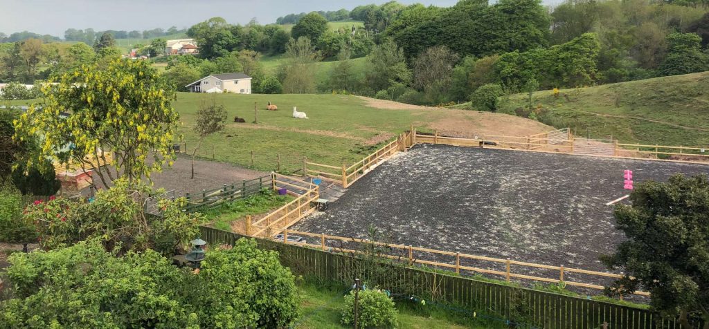 Building a cheap outdoor horse arena, my first riding arena completed